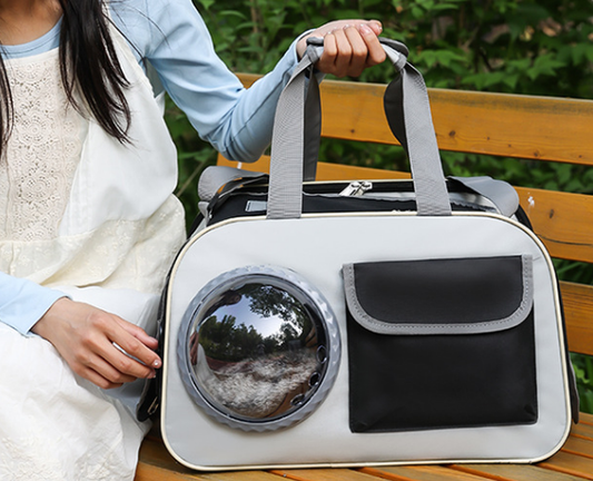 Transportín cápsula ventilado para gatos y perros pequeños